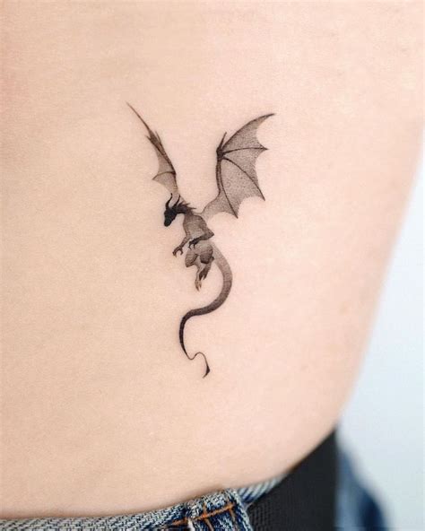 pretty dragon tattoos|simple dragon tattoos for women.